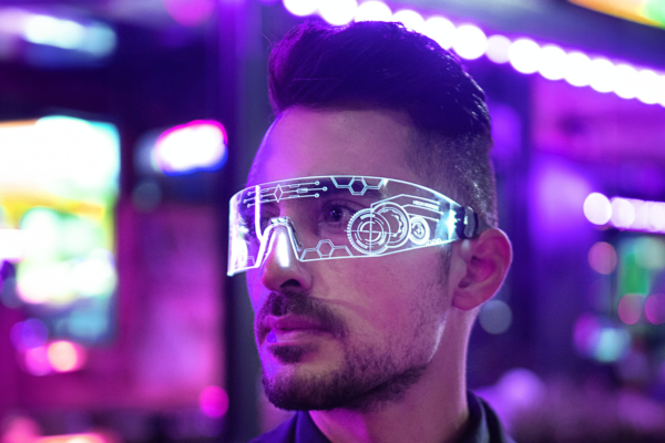 Minority Report predicted this would happen! Man wearing futuristic glasses