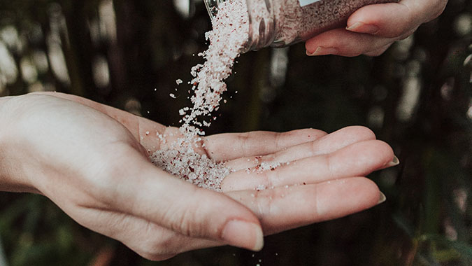 Salt of earth new therapy for healing pouring into hand