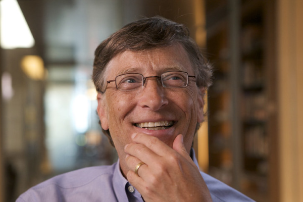 Bill Gates pictured looking introspective in a library