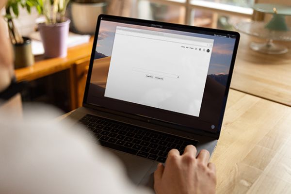 Woman looking at laptop screen