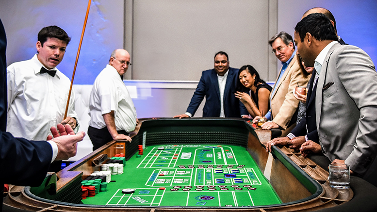 A group of people gambling at casino