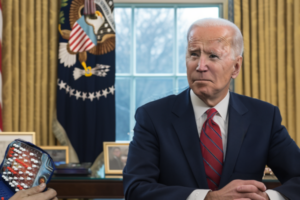 Joe Biden at the Oval Office with a battleship boardgame